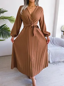 Elegant brown long-sleeved pleated maxi dress with V-neck and waist tie waist detail