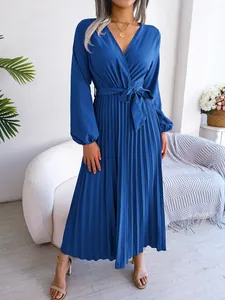 Elegant royal blue V-neck pleated maxi dress with waist tie and long puff sleeves