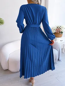 Back view of elegant royal blue V-neck long sleeve pleated maxi dress for women