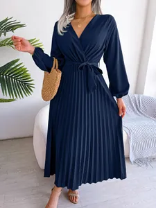 Elegant navy blue V-neck pleated maxi dress with lantern sleeves and tie-waist