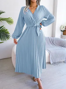 Elegant light blue pleated long dress with a deep V-neckline and matching waist tie belt.