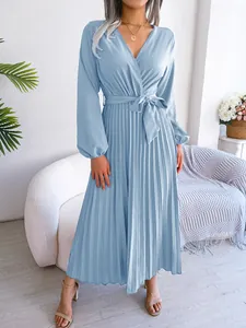 Elegant light blue V-neck pleated maxi dress with long sleeves and belted waist.