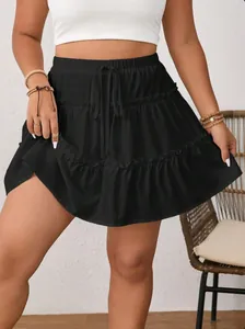Elegant black tiered cake skirt with adjustable drawstring waist and ruffle layers