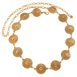 Elegant gold metal waist chain belt featuring intricate sunburst medallion details for dresses