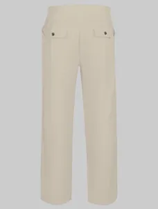 Back view of men's loose linen casual pants showing elastic waist and buttoned pockets.