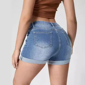 Rear view detail of stylish women's high-waisted blue denim shorts with cuffed hem