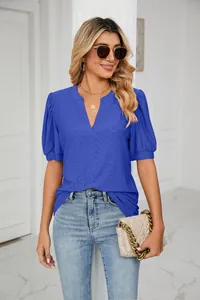 Detailed view of a blue V-neck top for women featuring eyelet hollow puff sleeves