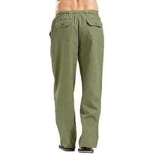 Back view of men's loose linen casual pants in olive green showing back pockets and fit