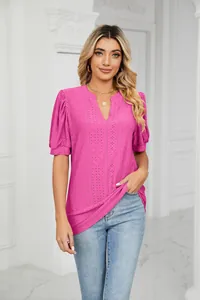 Detailed close-up of pink eyelet embroidery on a summer V-neck puff sleeve casual T-shirt