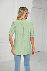 Detail view showing back of sage green eyelet puff sleeve casual women's t-shirt