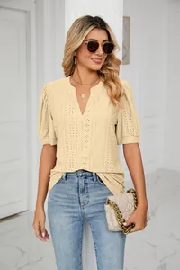 Detail of casual V-neck eyelet puff sleeve t-shirt with delicate hollow-out pattern