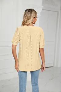 Back view of summer casual beige hollow-out top with puff sleeves and elegant loose fit