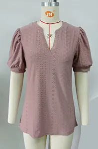 Elegant mauve V-neck summer top featuring intricate eyelet patterns and puff sleeves