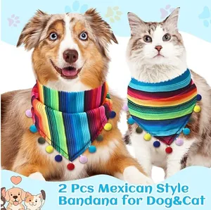 Two Mexican style striped pet bandanas with colorful pom-poms worn by a dog and cat.