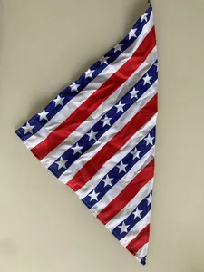 Detailed macro view of a pet bandana featuring iconic American flag stars and stripes pattern