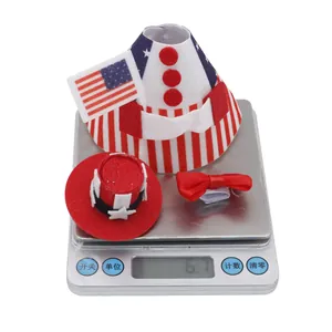 Detail shot of Independence Day themed pet costume set on a digital scale weighing 6.7g