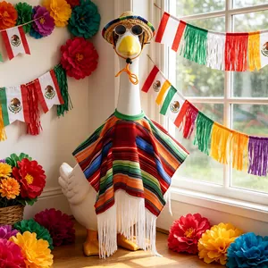 Close-up detail of 23-inch decorative goose wearing Mexican poncho, straw hat, and sunglasses.