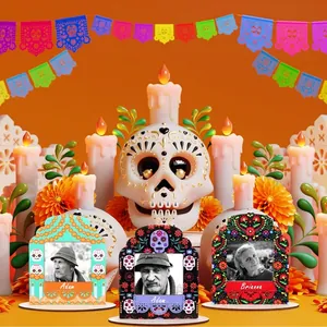 Close-up of Day of the Dead wooden picture frames with traditional Mexican motifs