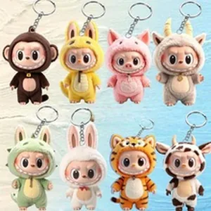 Assorted plush monster keychains featuring cute animal costumes and expressive teeth