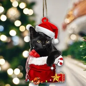 Festive Christmas tree ornament featuring a black cat in a Santa hat with bokeh background