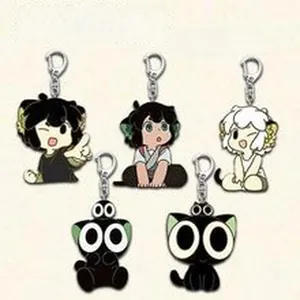 Close-up of five cute acrylic character keychains with silver metal lobster clasps