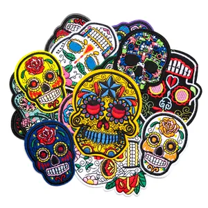 Set of colorful Day of the Dead sugar skull embroidered patches for clothing decoration