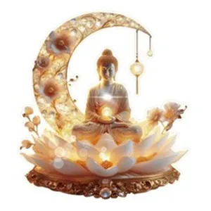 Detail of a glowing Buddha statue ornament on a lotus base with a decorative crescent moon