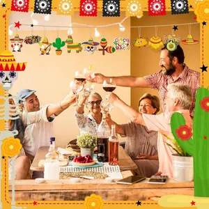 Friends celebrating at a table decorated with colorful Mexican wooden ornaments