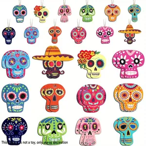 Set of colorful Mexican Day of the Dead wooden skull ornaments with hanging strings