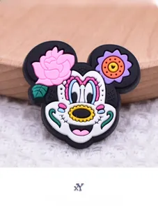 Detailed view of a sugar skull style Mickey Mouse PVC patch for DIY craft projects