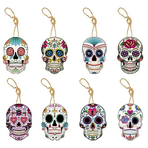 Festive Day of the Dead sugar skull hanging ornaments with colorful floral patterns