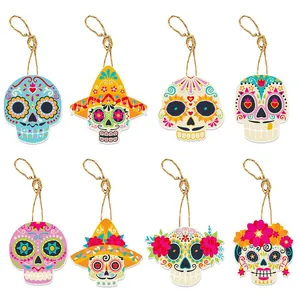 Detailed view of eight colorful Day of the Dead skull hanging decorations with twine