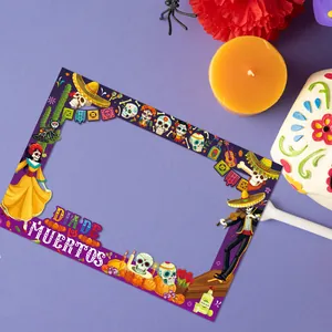 Detail of Dia de los Muertos photo booth frame with colorful skull illustrations