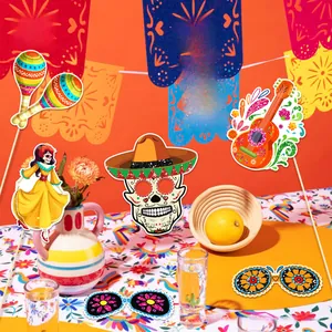Colorful Mexican Day of the Dead photo booth props set including sugar skull and guitar