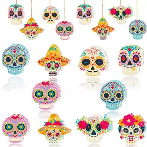 Colorful Día de los Muertos sugar skull hanging decorations for festive party atmosphere.