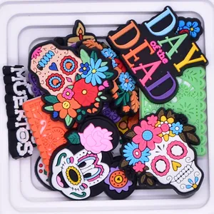 Assorted colorful Mexican Day of the Dead PVC charms for DIY phone cases and craft projects