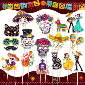 Collection of vibrant Day of the Dead photo booth props with sugar skulls and maracas