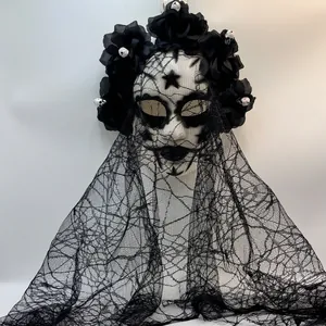 Detailed view of a Day of the Dead mask with black roses and a long spiderweb veil