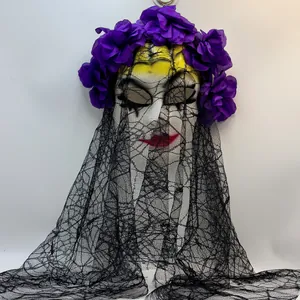 Detailed view of Mexican Day of the Dead mask with purple flowers and black lace veil