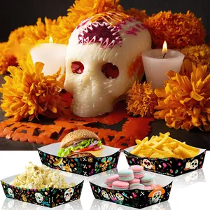 Mexican Day of the Dead themed disposable paper snack trays filled with various party food