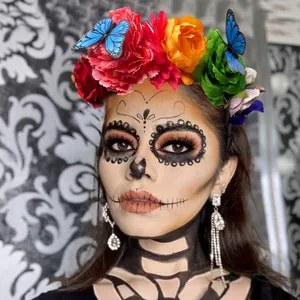 Vibrant Day of the Dead floral headband with butterflies and colorful roses for party