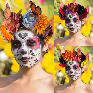 Close-up of Day of the Dead headband with colorful silk flowers and monarch butterflies