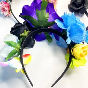 Detail shot of a colorful floral headband with vibrant simulation flowers and butterfly.