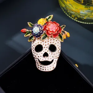 Halloween skull brooch with colorful enamel flowers on white textured mask pin