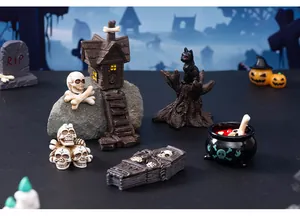 Detailed collection of Halloween resin miniature figurines including skulls and haunted house