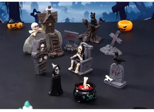 Detail view of various Halloween resin miniature figurines for creative desk decor