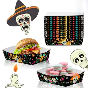 Detail view of Mexican Day of the Dead themed paper snack trays with skull patterns