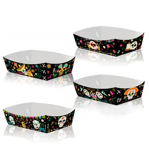 Detailed view of Mexican Day of the Dead themed paper snack trays with sugar skull patterns