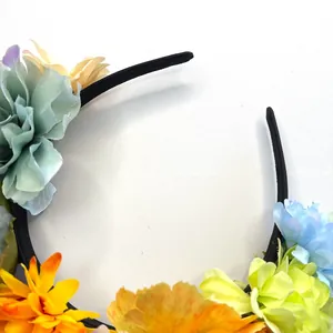 Detailed view of colorful faux rose flowers on a festive carnival party headband