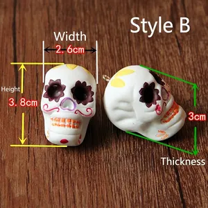 Macro detail view of handcrafted Halloween skull resin pendant with 3.8cm height dimension.